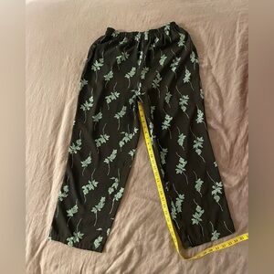 Flowy pants sz L elastic waist black and green lovey plant print
